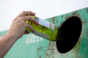 Sorting Waste - Recycling A Bottle